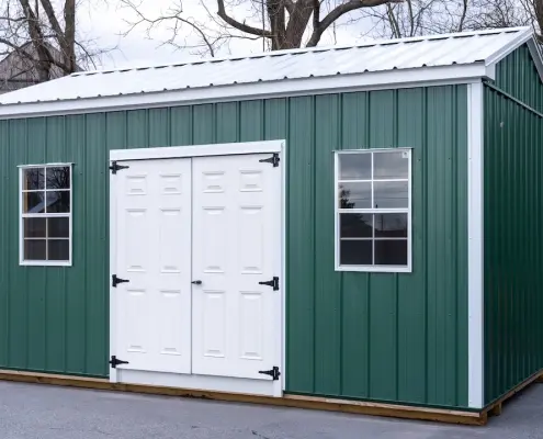 green metal cottage