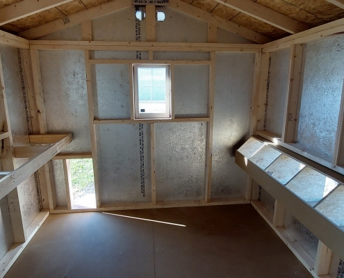 Inside view of cottage style chicken coop for backyard chickens.