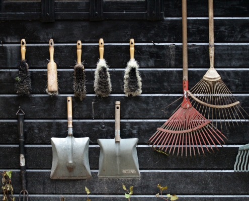 Examples of hanging tools in a outdoor garage