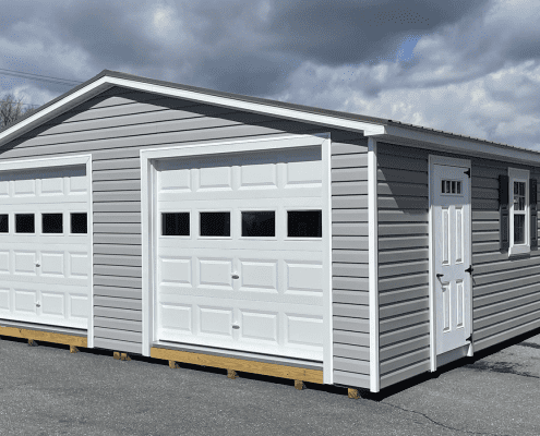 Two door grey detached garage.