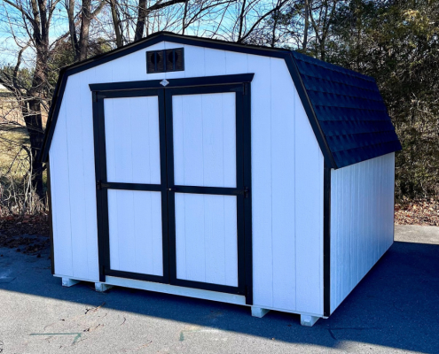 White Shed On Concrete