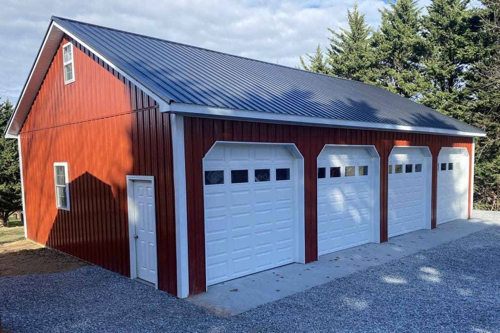 20211208_170053635_iOS Pole barn red three bay garage with metal roof