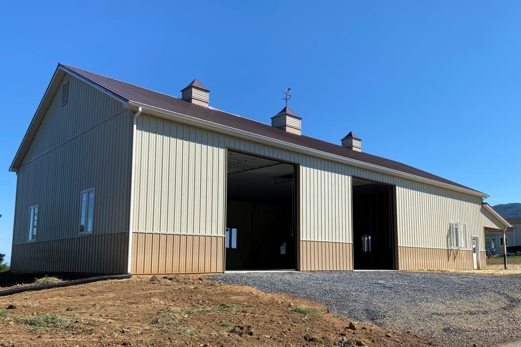 40x80x12_3 Large pole barn with two open bay doors